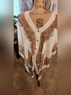 Convertible Tan Paisley Button-Front Ponchos.